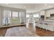 Open-concept kitchen and dining area boasts plenty of natural light and modern finishes at 6026 Rockdell Dr, Indianapolis, IN 46237