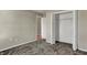 Bedroom featuring neutral carpet, open closet, and light-colored walls at 6026 Sally Ann Cir, Indianapolis, IN 46237