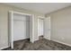 Spacious bedroom featuring neutral walls, plush carpeting, and an open closet at 6026 Sally Ann Cir, Indianapolis, IN 46237