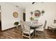 Well decorated dining area featuring a round table, modern decor, and natural light at 6276 Quail Rdg W Dr, Plainfield, IN 46168