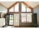 Inviting foyer features an abundance of natural light and a stylish front door with glass detailing and wood accents at 6276 Quail Rdg W Dr, Plainfield, IN 46168