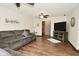 Inviting living room with a plush sofa, entertainment center, and neutral decor for a cozy atmosphere at 6276 Quail Rdg W Dr, Plainfield, IN 46168