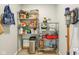 Pantry features metal shelves, a trash can, and other items that provide plenty of extra storage at 6481 Michigan Rd, Indianapolis, IN 46268