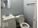 A clean half bathroom with updated fixtures and neutral paint at 6642 E 47Th St, Indianapolis, IN 46226