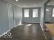 Open living area with modern flooring, neutral paint, and natural light at 6642 E 47Th St, Indianapolis, IN 46226