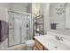 Bathroom features a glass-enclosed shower, vanity, and modern fixtures at 6681 Keepsake Dr, Whitestown, IN 46075