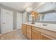 Large bathroom featuring double sink vanity, neutral walls, and tiled flooring at 6681 Keepsake Dr, Whitestown, IN 46075