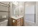 Bright bathroom featuring a light wood vanity, storage rack, and neutral wall paint at 6681 Keepsake Dr, Whitestown, IN 46075