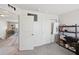 Upstairs bonus room with closet space and view to open stairwell at 6681 Keepsake Dr, Whitestown, IN 46075