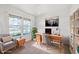 Cozy office with lots of natural light, a comfortable chair, and ample workspace at 6681 Keepsake Dr, Whitestown, IN 46075