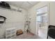 Spacious walk-in closet with wire shelving and open doorway to the bathroom at 6681 Keepsake Dr, Whitestown, IN 46075