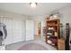Bedroom closet features shelving and view to the home's bathroom at 6681 Keepsake Dr, Whitestown, IN 46075