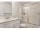 Bathroom with a single sink vanity, a frosted glass shower, and neutral finishes at 6953 Equality Blvd, Carmel, IN 46033