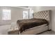 Spacious main bedroom featuring a large headboard, neutral tones, and natural light at 6953 Equality Blvd, Carmel, IN 46033