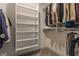 Organized walk-in closet with shelving and hanging rods, providing ample storage space at 6953 Equality Blvd, Carmel, IN 46033