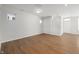 Spacious living room featuring beautiful wood floors and neutral paint, providing a warm and inviting atmosphere at 798 James William Ln, Westfield, IN 46074