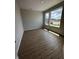 Bright home office with wood-look floors and large windows offering an abundance of natural light at 798 James William Ln, Westfield, IN 46074