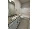 Bathroom with granite countertop vanity, tiled floors, toilet and shower-tub combination at 799 Rose Garden Way, Westfield, IN 46074