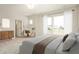 Bright bedroom featuring a neutral palette, carpeted floors, a sitting area and large sunny windows at 799 Rose Garden Way, Westfield, IN 46074