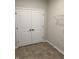 Walk-in closet with double doors, tile flooring and a wire shelf at 799 Rose Garden Way, Westfield, IN 46074