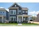 Charming two-story home with a welcoming front porch and beautifully landscaped front yard at 799 Rose Garden Way, Westfield, IN 46074