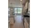 Gourmet kitchen with granite counters, stainless steel appliances, and a breakfast bar, perfect for entertaining at 799 Rose Garden Way, Westfield, IN 46074