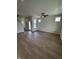 Spacious living room with hardwood floors and large windows, perfect for relaxing and entertaining at 799 Rose Garden Way, Westfield, IN 46074