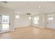 Inviting living room with large windows and a welcoming front entrance at 799 Rose Garden Way, Westfield, IN 46074