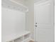 Functional mudroom with built-in bench, coat hooks, and storage cubbies for organization at 799 Rose Garden Way, Westfield, IN 46074