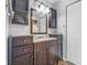 Bathroom with dark wood cabinets at 8158 Shorewalk Dr # F, Indianapolis, IN 46236
