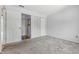 Bedroom with closet and view into hallway at 8158 Shorewalk Dr # F, Indianapolis, IN 46236