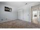 Bedroom with closet, light-colored walls and carpet at 8158 Shorewalk Dr # F, Indianapolis, IN 46236