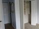 Bedroom interior with open closet showing shelving and hanging space at 8158 Shorewalk Dr # F, Indianapolis, IN 46236