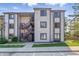 Inviting condo complex featuring a well-maintained exterior and convenient outdoor staircases for easy access at 8158 Shorewalk Dr # F, Indianapolis, IN 46236