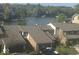 View of townhouses, showing garages and proximity to lake at 8158 Shorewalk Dr # F, Indianapolis, IN 46236