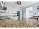 Bright kitchen with stainless steel appliances and granite countertops at 8158 Shorewalk Dr # F, Indianapolis, IN 46236