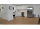 Modern kitchen with white cabinets, stainless steel appliances, and ample counter space at 838 Highland Dr, Whiteland, IN 46184