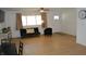Inviting living room with light wood floors, bright lighting, and neutral decor at 838 Highland Dr, Whiteland, IN 46184