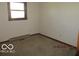 Bedroom with window and hardwood trim at 8625 Edith St, Martinsville, IN 46151