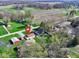 Aerial view of home showing nearby farmland and neighborhood at 8745 Big Bend Rd, Martinsville, IN 46151