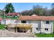 Back exterior of the home with a wood deck and a walk out basement at 8745 Big Bend Rd, Martinsville, IN 46151