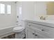 Bright bathroom with a modern vanity, a large mirror, and a tub-shower combo at 8745 Big Bend Rd, Martinsville, IN 46151