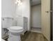 Well-lit bathroom features a toilet, vanity, and modern fixtures at 8745 Big Bend Rd, Martinsville, IN 46151