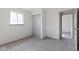Bedroom showcasing closet, window and soft carpet at 8745 Big Bend Rd, Martinsville, IN 46151