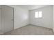 Neutrally decorated bedroom with window and closet at 8745 Big Bend Rd, Martinsville, IN 46151