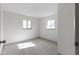 Bright bedroom featuring two windows and neutral tones at 8745 Big Bend Rd, Martinsville, IN 46151