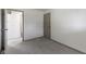 This bedroom has neutral paint, plush carpeting, and ample natural light at 8745 Big Bend Rd, Martinsville, IN 46151