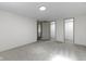 Spacious bedroom featuring neutral carpet, paint and a view of adjoining rooms at 8745 Big Bend Rd, Martinsville, IN 46151