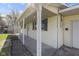 A long view of the home with covered porch, multiple windows, and a clean yard at 8745 Big Bend Rd, Martinsville, IN 46151