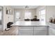 Kitchen featuring a marble countertop island, and natural light from the window at 89 E Walnut St, Fountaintown, IN 46130